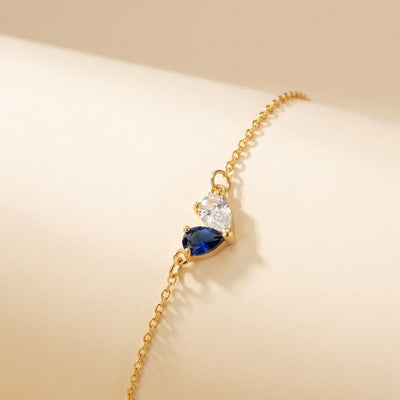 Birthstone Heart Bracelet - studio packshot with sapphire and diamond