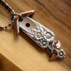 Cross Border Birdhouse Necklace - Sphere Standouts