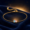 Duo birthstone bracelet in gold with aquamarine and pink tourmaline stones
