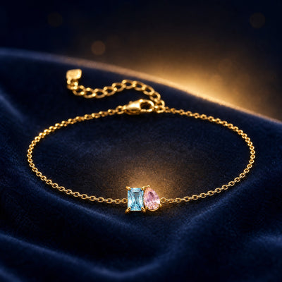 Duo birthstone bracelet in gold with aquamarine and pink tourmaline stones