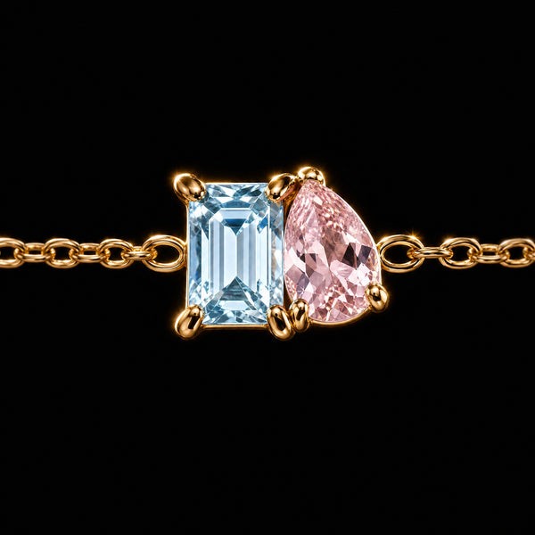 Mother and daughter wearing matching duo birthstone bracelets