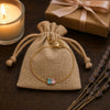 Duo birthstone bracelet with a jute gift pouch