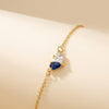 Birthstone Heart Bracelet - studio packshot with sapphire and diamond