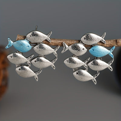 Upstream Fish Stud Earrings — close-up detail view